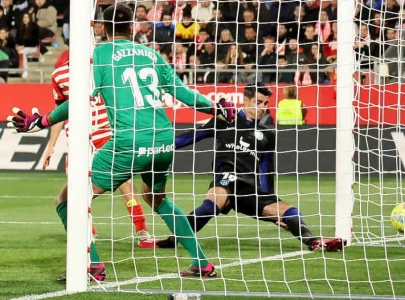 morata strikes late as atletico beat girona morata strikes late as atletico beat girona