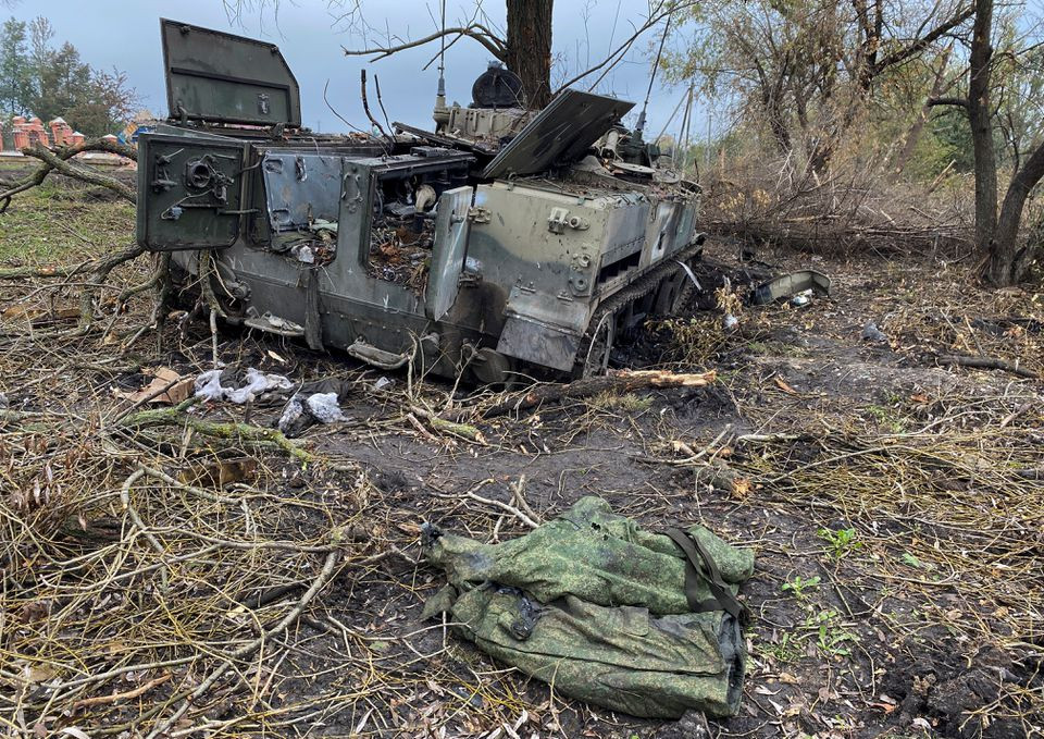 military uniform lays next to an abandoned russian infantry fighting vehicle bmd 4 in the village of kurylivka amid russia s attack on ukraine in kharkiv region ukraine october 1 2022 reuters vitalii hnidyi