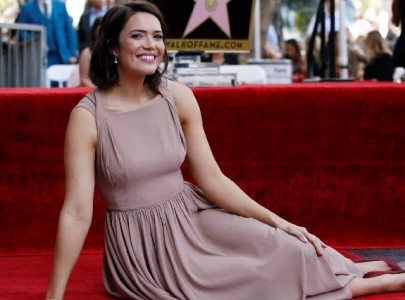 mandy moore reveals baby bump after announcing third pregnancy