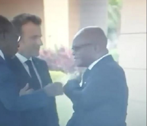 video shows benin fm cleaning shoulder after being touched by macron video shows benin fm cleaning shoulder after being touched by macron