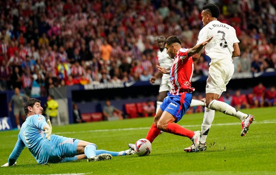 atletico madrid s angel correa scores goal in a laliga derby between atletico madrid and real madrid at metropolitano madrid spain on september 29 2024 photo reuters