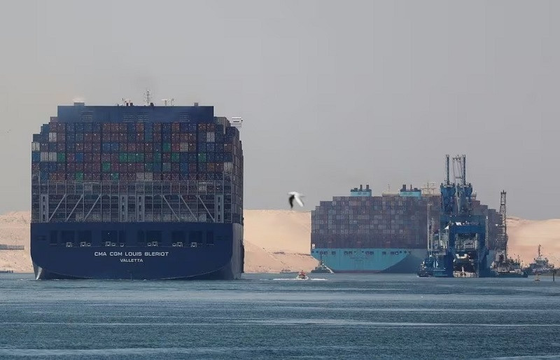 cma cgm louis bleriot and a maersk line container ship pass through the suez canal in ismailia egypt july 7 2021 picture taken july 7 2021 photo reuters