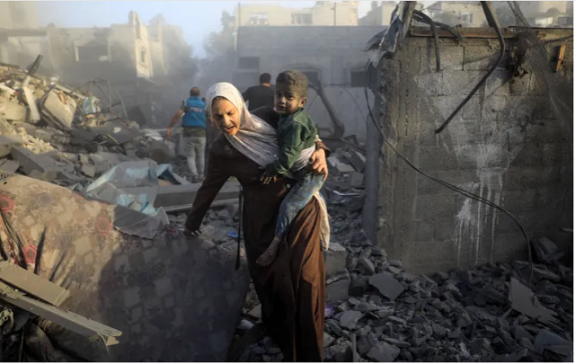 people flee following israeli air attacks in the al maghazi refugee camp in central gaza photo afp