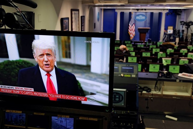 us president donald trump is seen making remarks on a television monitor from the white house briefing room after his supporters interrupted the certification by the us congress of the results of the 2020 us presidential election at the washington capitol in washington us january 6 2021 photo reuters