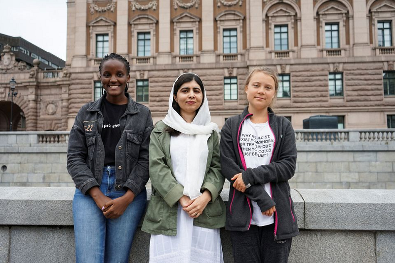 Ugandan climate activist Vanessa Nakate, Nobel peace prize winner Malala Yousafzai and Swedish activist Greta Thunberg attend a 
