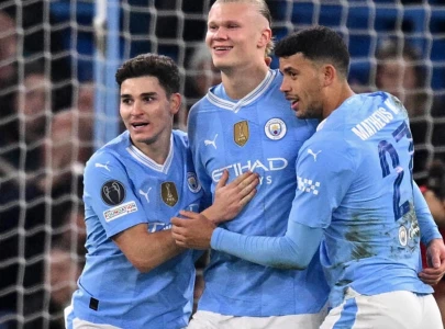 haaland shines as man city cruise into ucl quarters