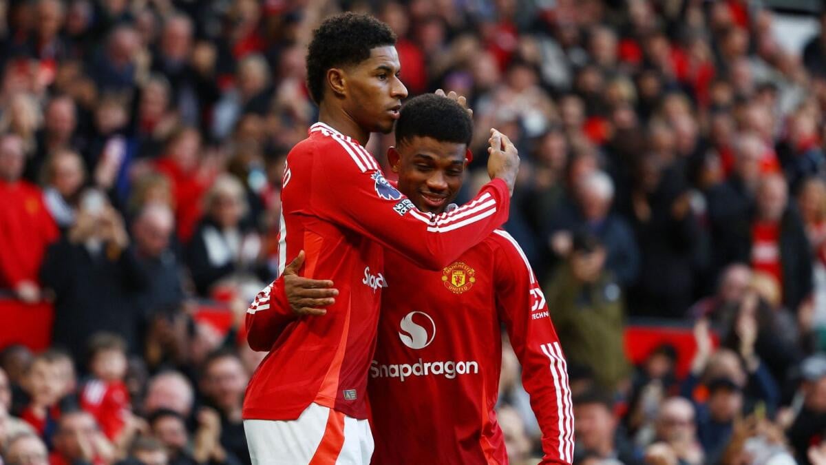 manchester united s marcus rashford celebrates scoring their third goal with amad diallo photo reuters