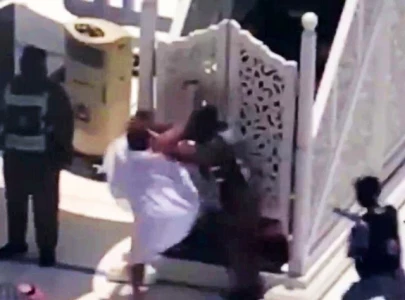 watch man held for trying to access pulpit during friday sermon at khana e kaaba