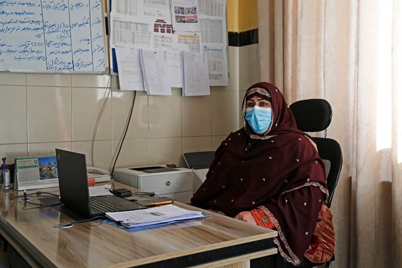 Nasrin Oryakhil, manager at Norwegian Afghanistan Committee (NAC)-run Comprehensive-Continuum of Care Centre, a maternity hospital, at her office in the facility at Gardez, the capital of Afghanistan's Paktia province,  December 7, 2023. PHOTO: AFP