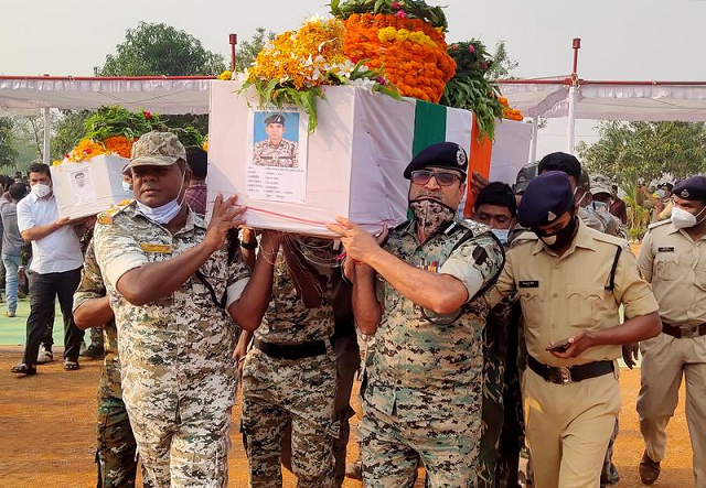 security forces officers carry the body of a colleague who was killed in an attack by maoist fighters during a wreath laying ceremony in bijapur in the central state of chhattisgarh india april 5 2021 photo reuters