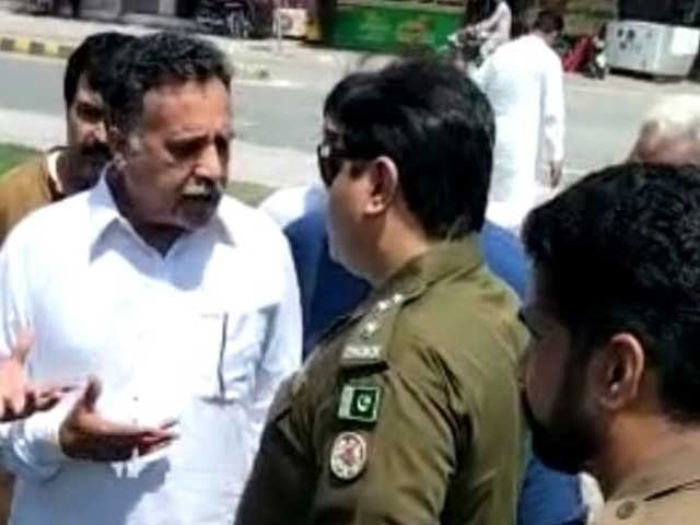 pti leader maqbool gujjar escaped in another car when officials attempted to take him to the police station for violating government s order photo express