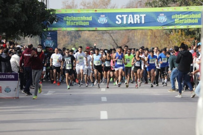 hundreds pour onto streets as islamabad holds its first full marathon hundreds pour onto streets as islamabad holds its first full marathon