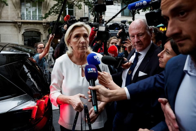 marine le pen member of parliament and far right rn party leader arrives at the rn party headquarters in paris france july 1 2024 photo reuters marine le pen member of parliament and far right rn party leader arrives at the rn party headquarters in paris france july 1 2024 photo reuters