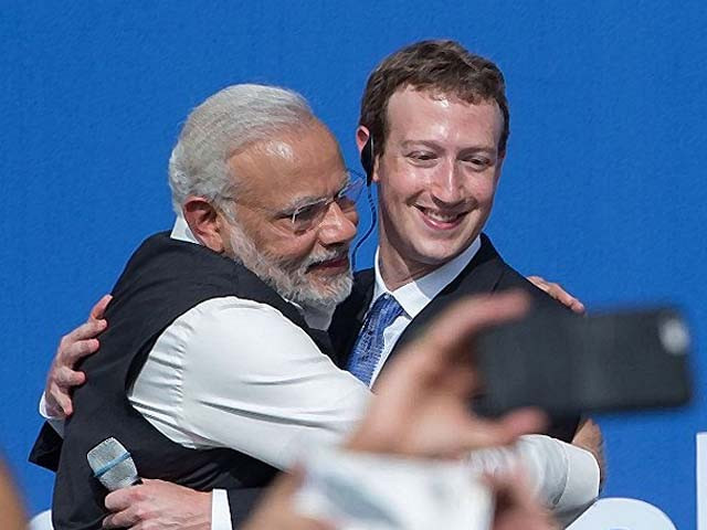 narendra modi and mark zuckerberg hug after a meeting photo afp