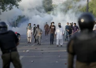 protestors throw stones after police fire tear gas to disperse them in lahore on may 9 2023 photo reuters protestors throw stones after police fire tear gas to disperse them in lahore on may 9 2023 photo reuters