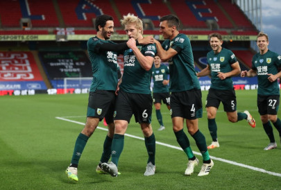 mee heads burnley up to eighth with win at palace