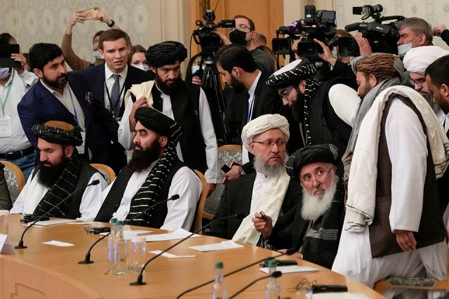 head of the taliban delegation abdul salam hanafi and other members of the delegation take part in international talks on afghanistan in moscow russia october 20 2021 photo reuters