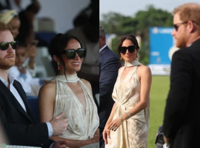 meghan markle sports halter dress for final day in nigeria
