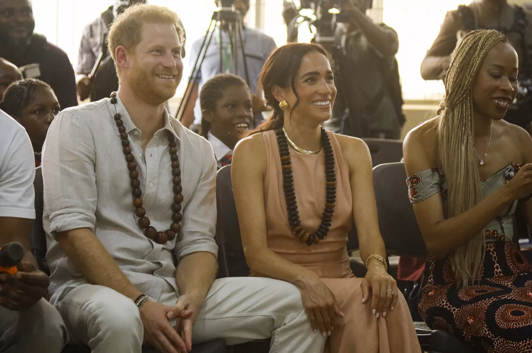 prince harry and meghan markle at the lightway academy in abuja nigeria photo andrew esiebo