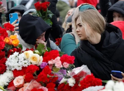 russia mourns victims of deadly concert hall attack putin promises punishment