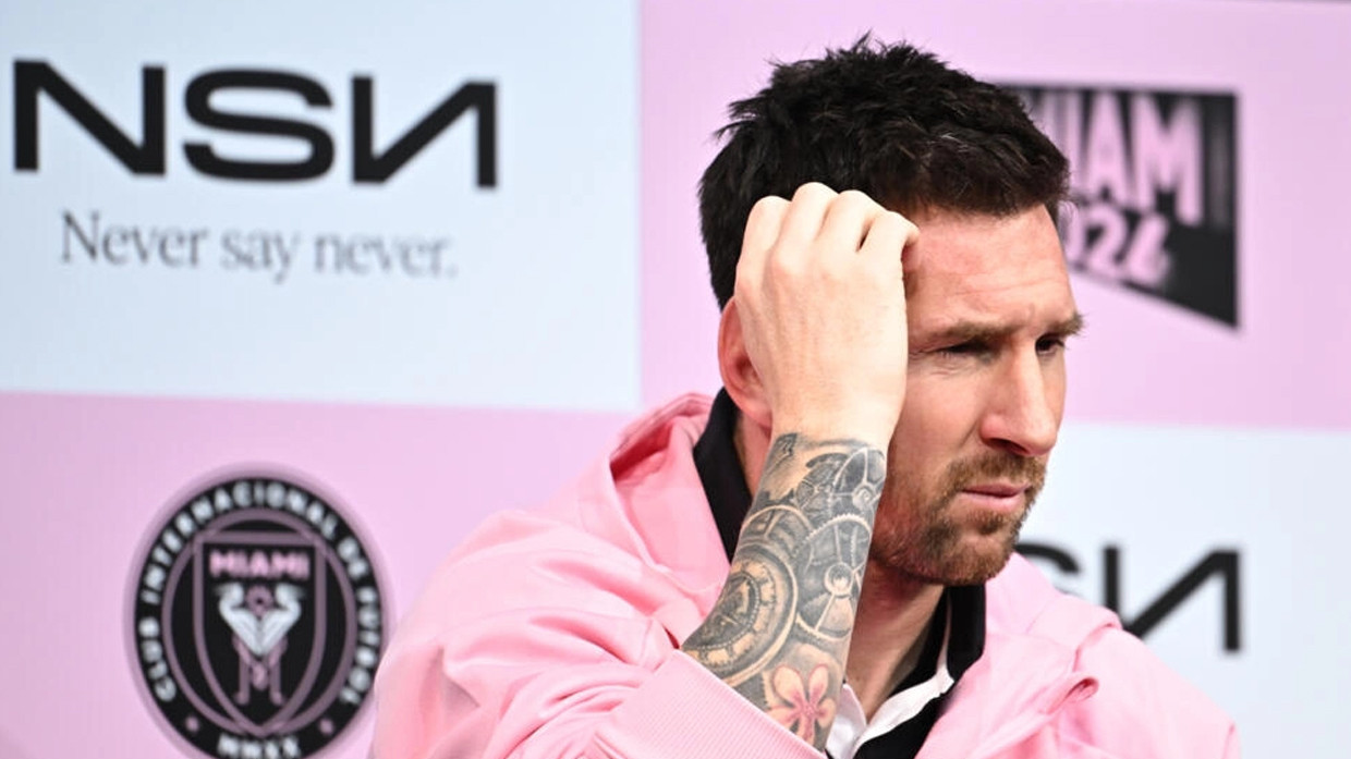 lionel messi talks to reporters in tokyo two days after being booed off for sitting out a pre season friendly in hong kong photo afp