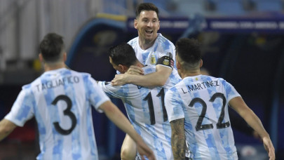 messi stars as argentina set up colombia semi final
