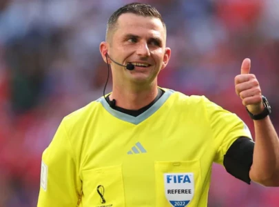 michael oliver under fire as fans react to leandro trossard s red card against manchester city