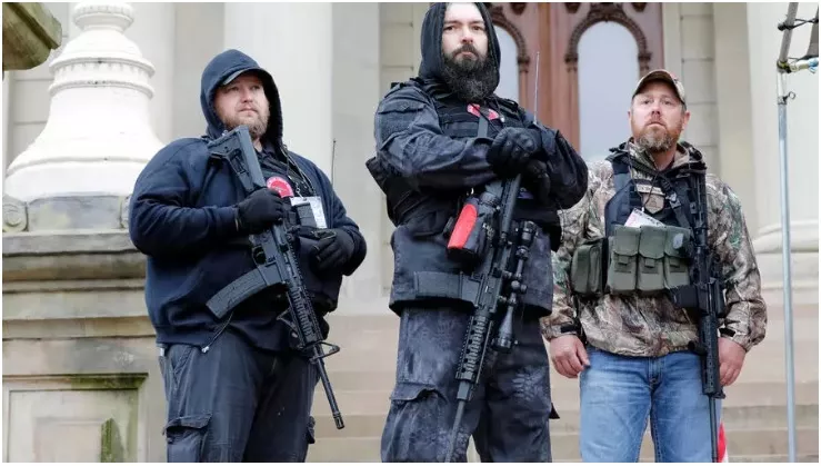 michael null l one of those arrested in the plot to kidnap michigan governor gretchen whitmer at an april 2020 rally against covid 19 restrictions photo afp michael null l one of those arrested in the plot to kidnap michigan governor gretchen whitmer at an april 2020 rally against covid 19 restrictions photo afp