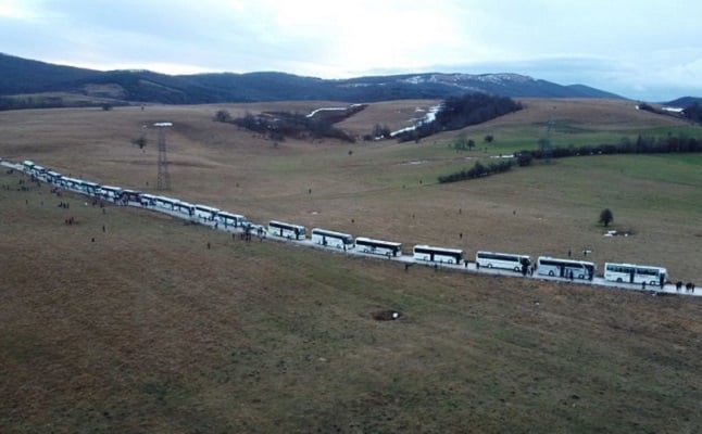 hundreds of migrants wait in busses after camp lipa was closed in bihac bosnia and herzegovina december 30 2020 photo taken with a drone photo reuters