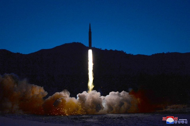 a missile is launched during what state media report is a hypersonic missile test at an undisclosed location in north korea january 11 2022 in this photo released january 12 2022 by north korea s korean central news agency kcna photo reuters