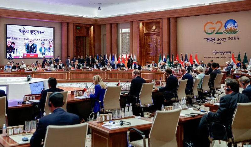 indian prime minister narendra modi appears on a screen as he attends session ii one family at the g20 summit in new delhi india september 9 2023 photo reuters