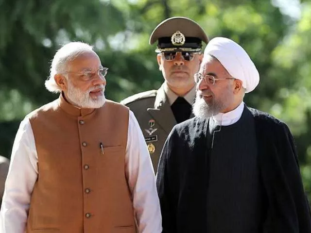 iranian president hassan rouhani right walks alongside indian prime minister narendra modi during a welcome ceremony in tehran on may 23 2016 photo afp iranian president hassan rouhani right walks alongside indian prime minister narendra modi during a welcome ceremony in tehran on may 23 2016 photo afp
