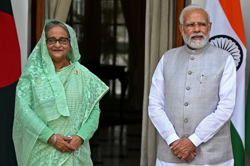 india s prime minister modi and his bangladeshi counterpart sheikh hasina pose for pictures during the latter s visit to india in 2022 photo afp