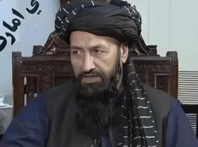 afghan diplomat defends sitting during pakistan anthem due to music