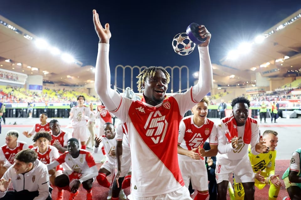 monaco s george ilenikhena celebrates with the player of the match trophy and teammates after the champions league match between as monaco v fc barcelona at stade louis ii monaco on september 19 2024 photo reuters