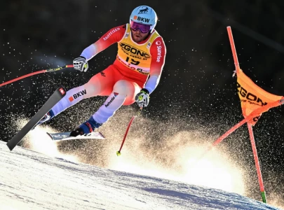 swiss monney takes maiden world cup win