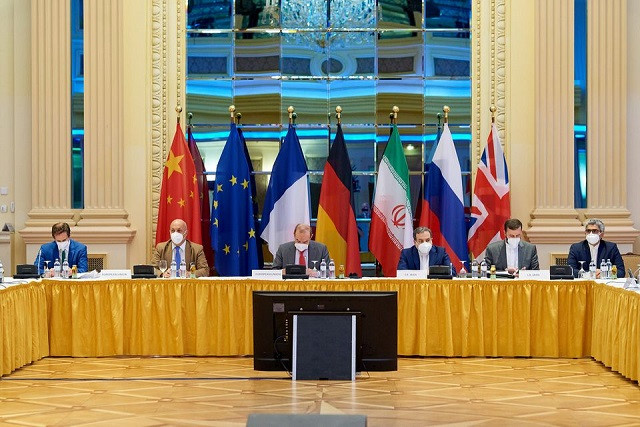 european external action service eeas deputy secretary general enrique mora and iranian deputy at ministry of foreign affairs abbas araghchi wait for the start of talks on reviving the 2015 iran nuclear deal in vienna austria june 20 2021 photo reuters