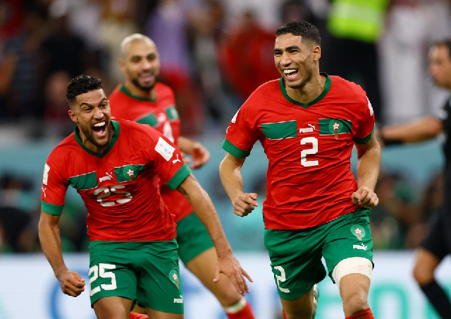 morocco s achraf hakimi celebrates after scoring the winning penalty during the penalty shootout as morocco progress to the quarter finals december 6 2022 photo reuters morocco s achraf hakimi celebrates after scoring the winning penalty during the penalty shootout as morocco progress to the quarter finals december 6 2022 photo reuters