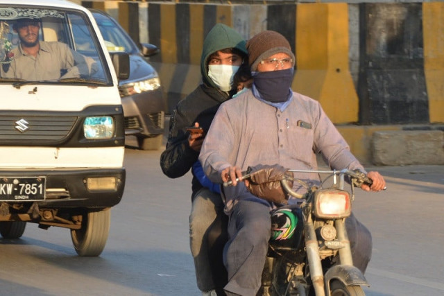 a majority of motorcyclist drive around their motorcycles without rear view mirrors photo express