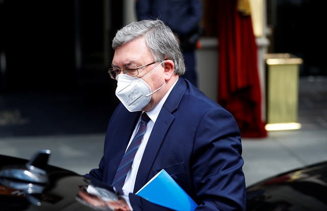 russia s governor to the international atomic energy agency iaea mikhail ulyanov arrives for a meeting of the joint commission of the joint comprehensive plan of action jcpoa in vienna austria april 20 2021 photo reuters