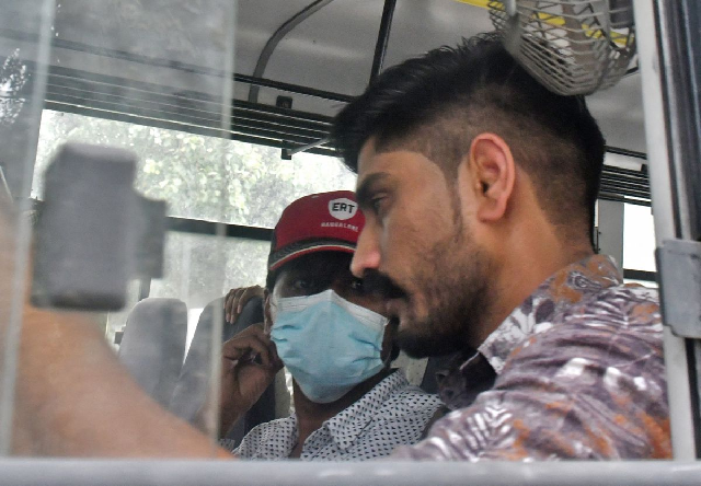 mohammed zubair a journalist and a co founder of fact checking website alt news sits in a police vehicle outside a court in new delhi india june 28 2022 photo reuters