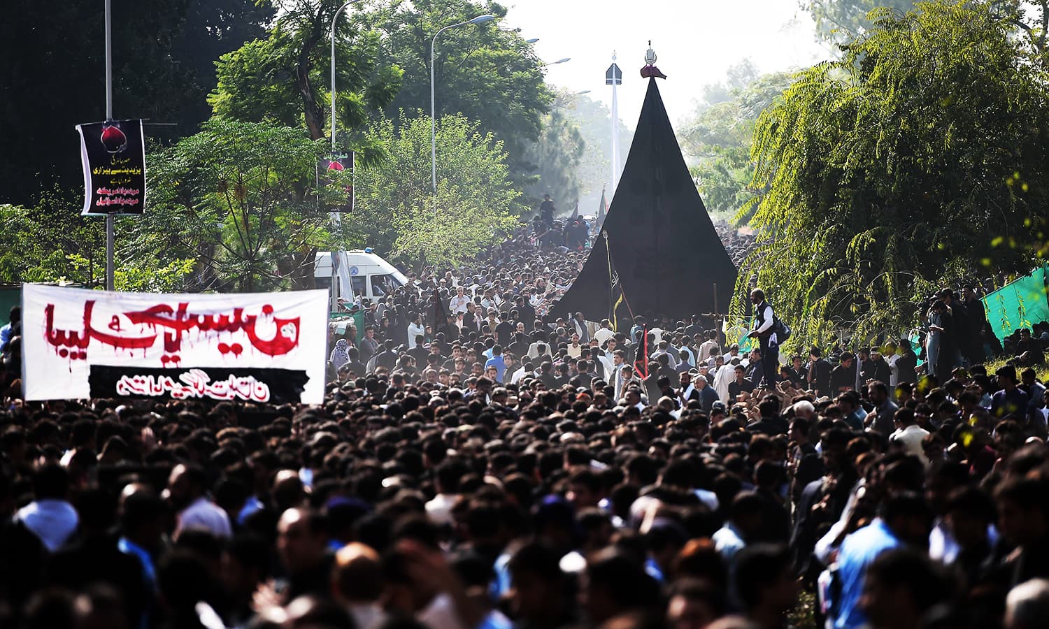 mourners take part in a procession in islamabad photo afp