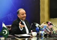 minister of state for petroleum dr musadik malik addressing a press conference in islamabad on december 5 2022 photo pid