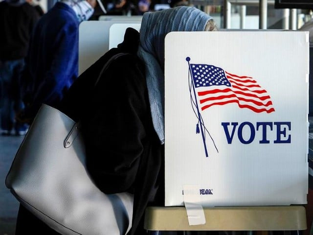a voter fills out her ballot during early voting at oneok field in tulsa oklahoma us october 30 2020 photo reuters file a voter fills out her ballot during early voting at oneok field in tulsa oklahoma us october 30 2020 photo reuters file