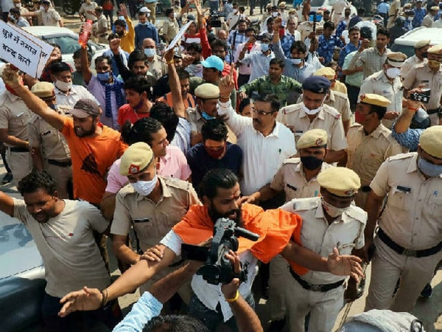 police secure the site of friday prayers as hindu right wing groups protest in gurgaon photo afp file police secure the site of friday prayers as hindu right wing groups protest in gurgaon photo afp file