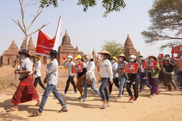 demonstrators march during a protest against the military coup near temples in bagan myanmar february 18 2021 photo reuters demonstrators march during a protest against the military coup near temples in bagan myanmar february 18 2021 photo reuters