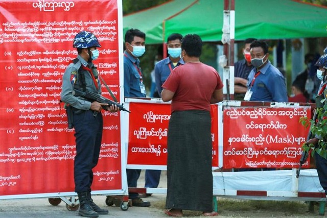 myanmar s police officers stand guard at the entrance of parliament members residence at the congress compound in naypyitaw myanmar february 2 2021 photo reuters