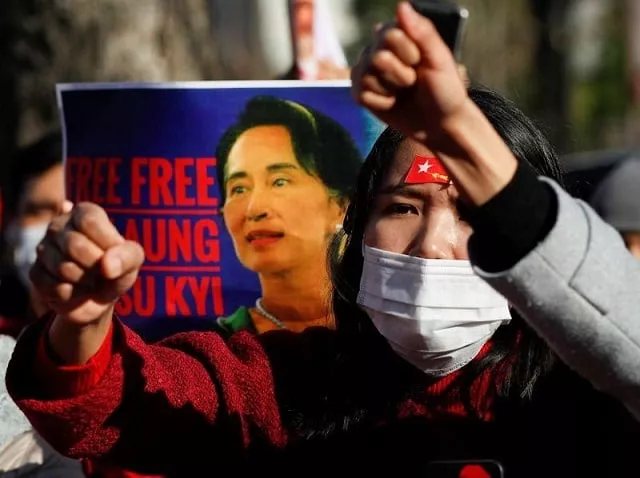 protesters from myanmar residing in japan raise their fists and hold a poster depicting aung san suu kyi during a rally against myanmar s military after it seized power from a democratically elected civilian government and arrested suu kyi outside foreign ministry in tokyo japan february 3 2021 photo reuters protesters from myanmar residing in japan raise their fists and hold a poster depicting aung san suu kyi during a rally against myanmar s military after it seized power from a democratically elected civilian government and arrested suu kyi outside foreign ministry in tokyo japan february 3 2021 photo reuters