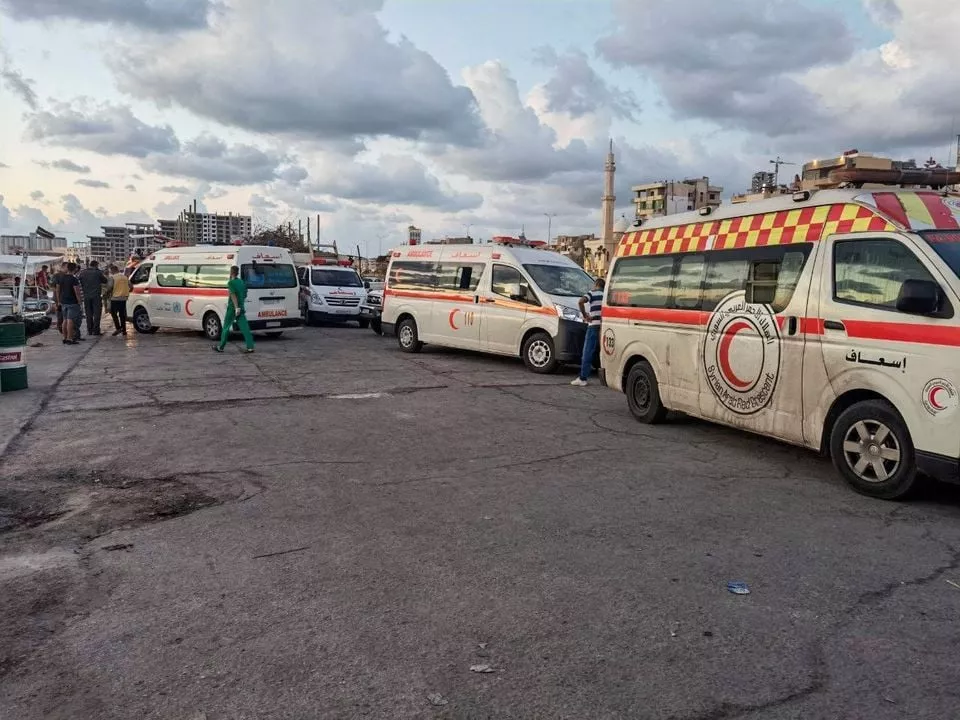 ambulances are seen during the rescue process of migrants in the port of tartous syria september 22 2022 in this picture obtained from social media saleh sliman via reuters ambulances are seen during the rescue process of migrants in the port of tartous syria september 22 2022 in this picture obtained from social media saleh sliman via reuters