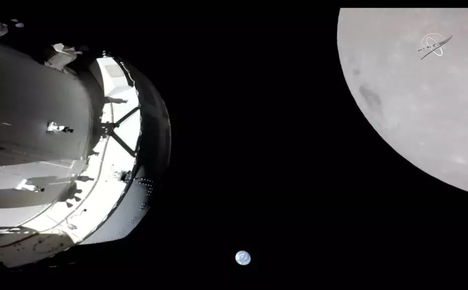 a camera on orion s solar array wing captures a view of the spacecraft the earth and the moon during the spacecraft s outbound powered flyby of the moon as part of the artemis i mission november 21 2022 in a still image from video artemis i the first flight test of nasa s orion capsule and space launch system rocket launched november 16 2022 photo reuters a camera on orion s solar array wing captures a view of the spacecraft the earth and the moon during the spacecraft s outbound powered flyby of the moon as part of the artemis i mission november 21 2022 in a still image from video artemis i the first flight test of nasa s orion capsule and space launch system rocket launched november 16 2022 photo reuters